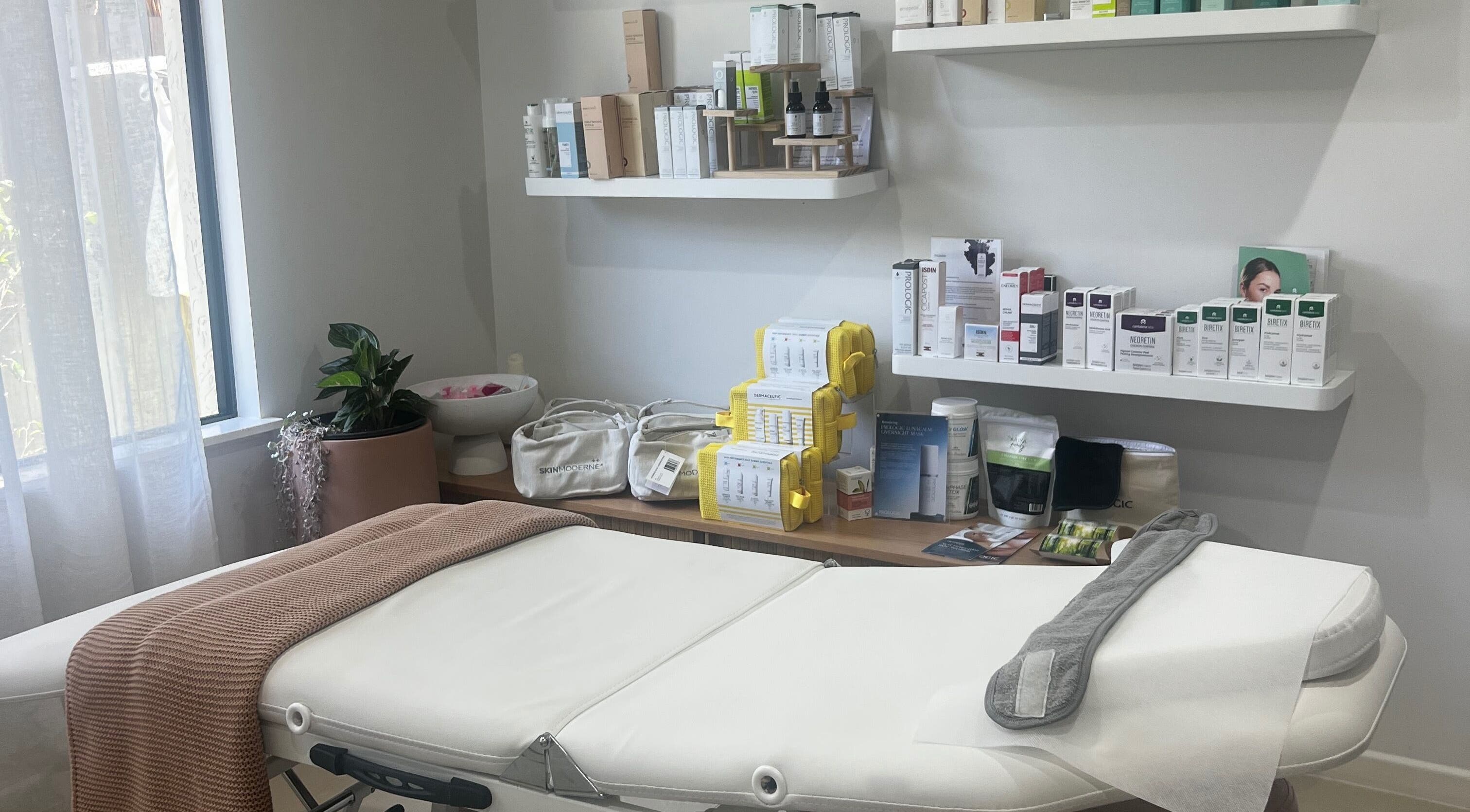 Luxurious treatment room at Healthy Skin Lab, Trinity Beach, Queensland, AU, showcasing premium skincare products.