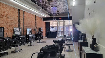 Interior of Emmah at Transcendence Salon & Spa, Columbus, Nebraska, US, with stylish salon chairs and decor.