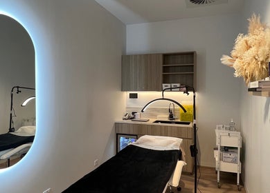 Modern treatment room at Alpha Lash & Brow, St Leonards, New South Wales, AU with soft lighting and elegant decor.