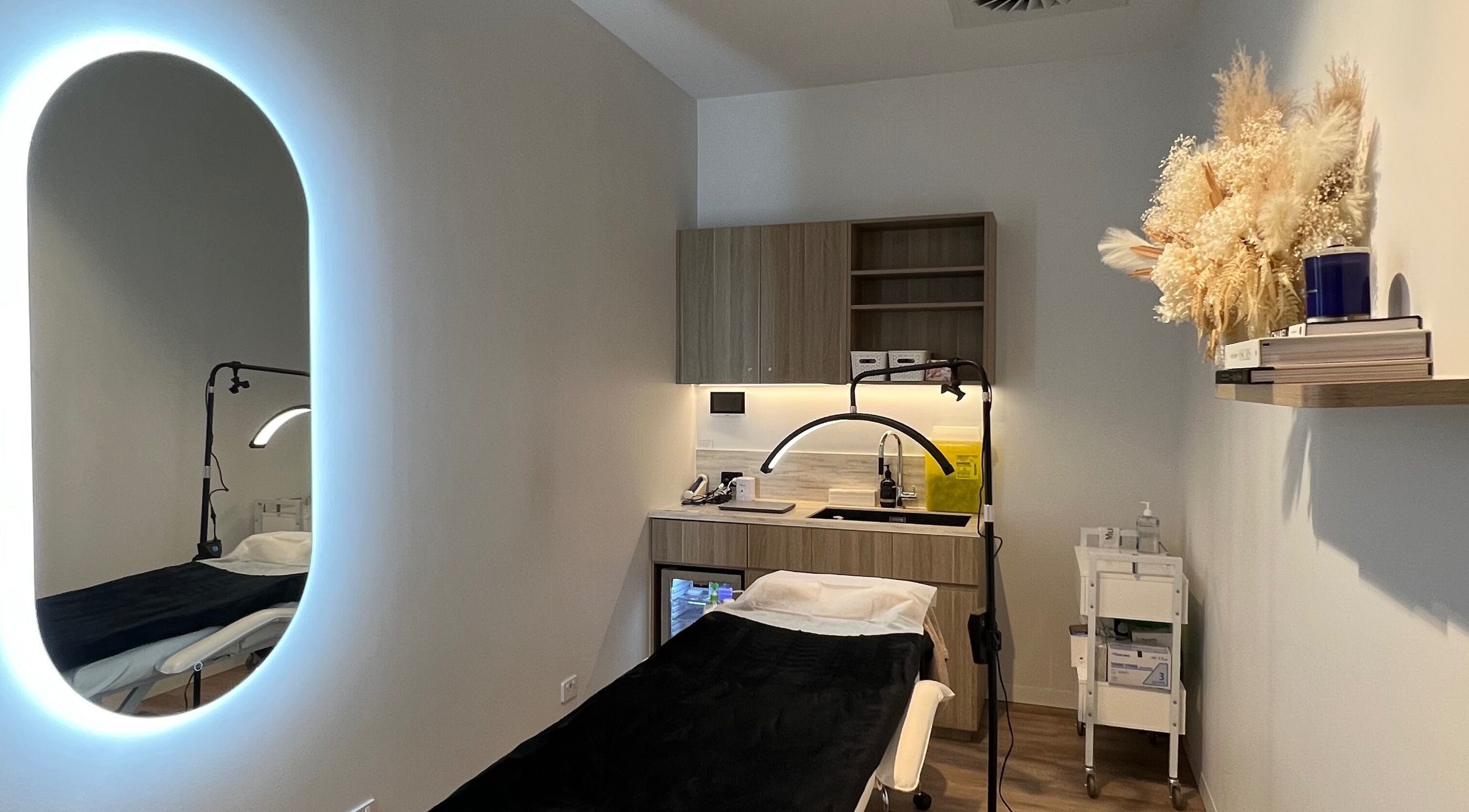 Relaxing treatment room at Alpha Lash & Brow in St Leonards, New South Wales, AU, featuring modern decor.