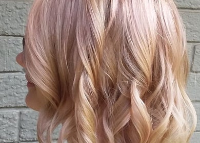 Soft, wavy hairstyle showcased at HAIR BY LILI in Pretoria, Gauteng, ZA. Perfect blend of modern and chic.