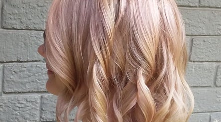 Soft, wavy hairstyle showcased at HAIR BY LILI in Pretoria, Gauteng, ZA. Perfect blend of modern and chic.