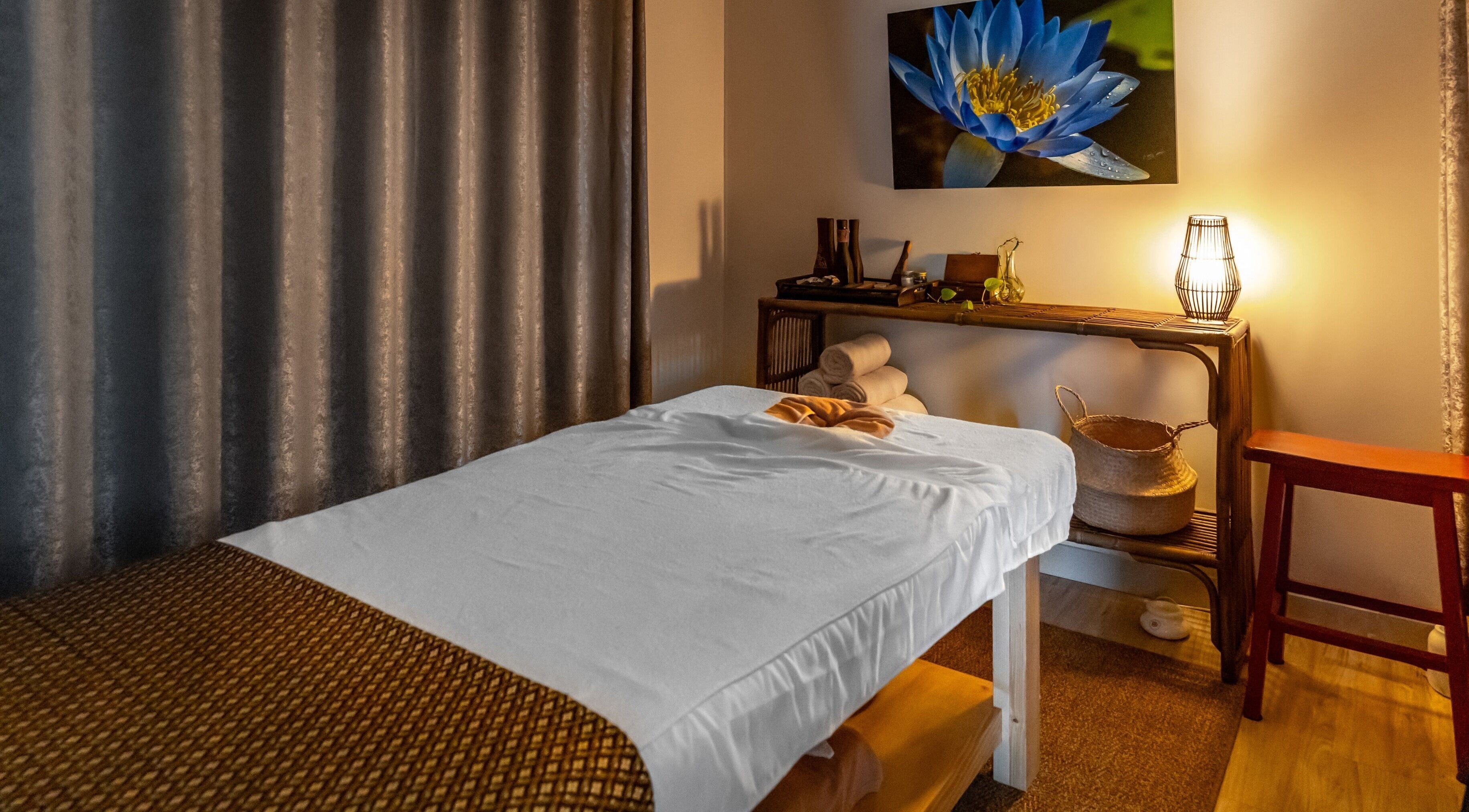 Cozy massage room at Genuine Thai Massage in Noosaville, Queensland, AU, featuring a serene ambiance and soothing decor.