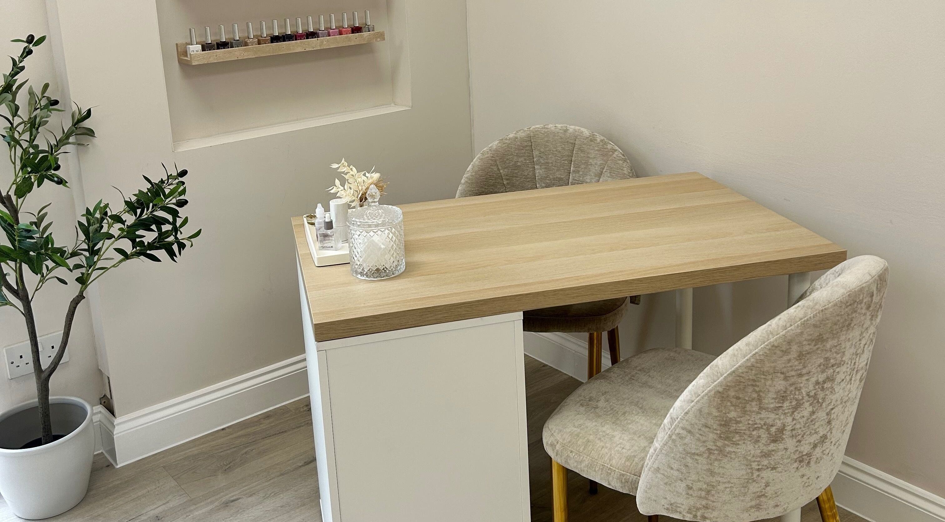 Nail treatment table at Olea The Room of Beauty, Hemingford Grey, England, GB with elegant decor.