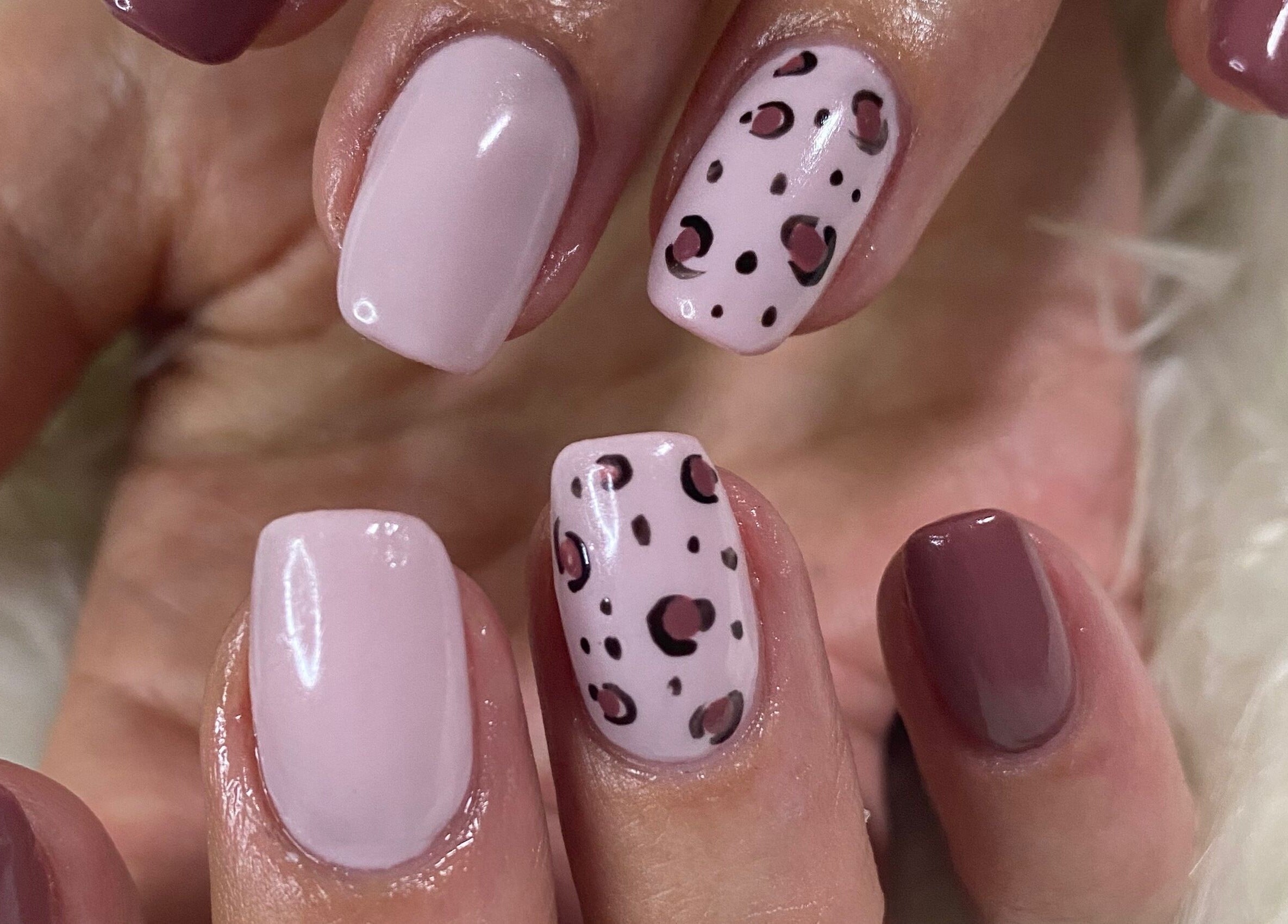 Stylish nail art at Bron’s Boho Beautique in Centurion, Gauteng, ZA showcasing leopard print design.