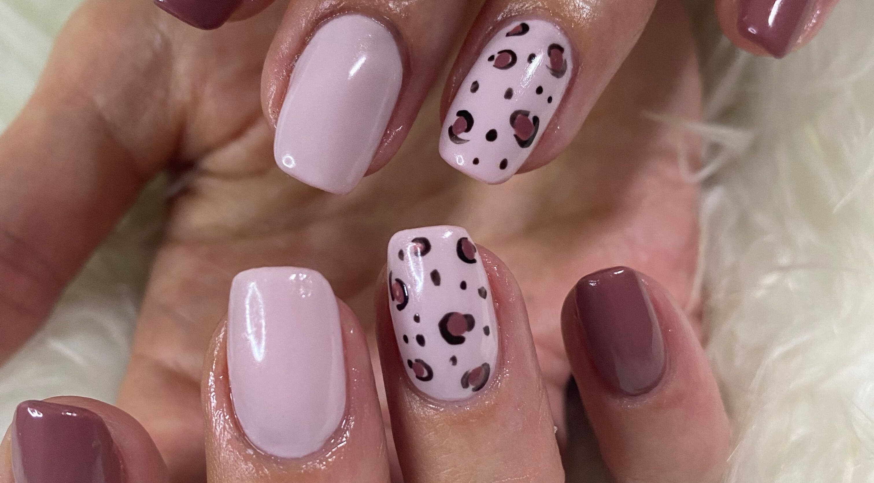 Stylish nail art at Bron’s Boho Beautique in Centurion, Gauteng, ZA showcasing leopard print design.