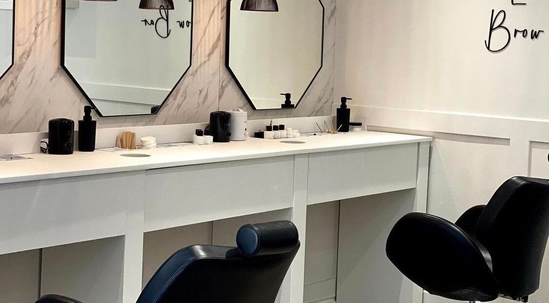 Chic salon stations at Flawless Faces - Hair & Beauty, Stamford, England, GB showcase modern elegance.