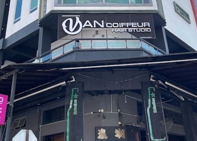 Entrance of Van Coiffeur Hair Studio, Malacca, Malacca, MY, showing modern architectural details.