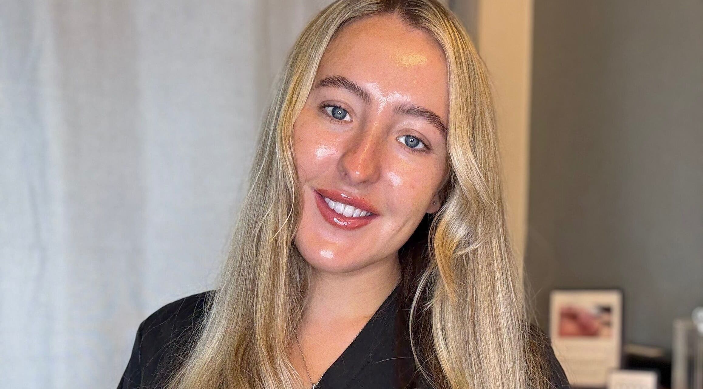 Professional beautician smiling at AR Aesthetics, Eccles, England, GB.