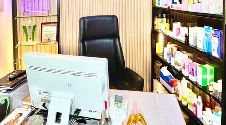Reception area at Queen Bello Services, Lagos, Lagos, NG, showcasing beauty products on display shelves.