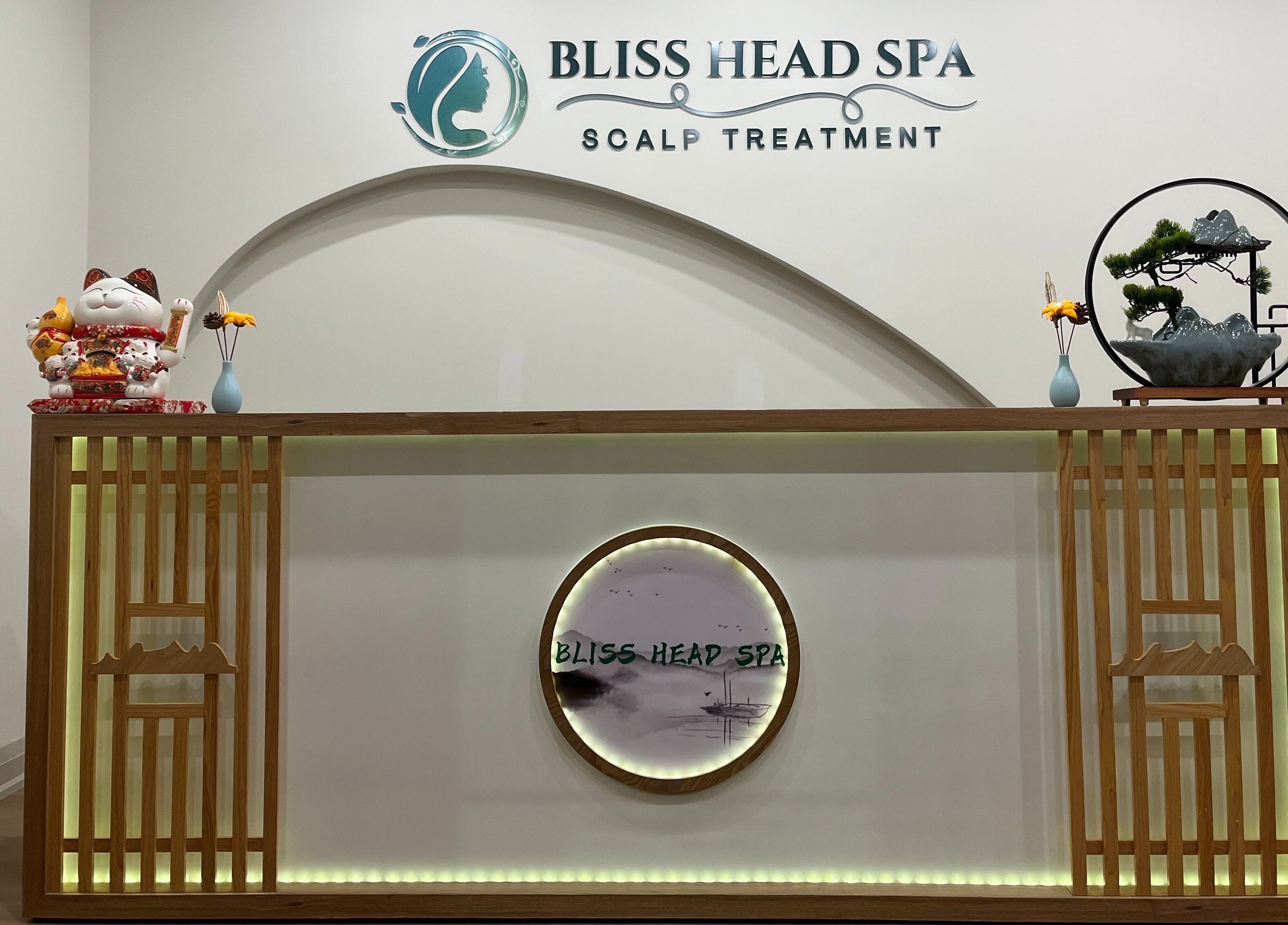 Reception area of Bliss Head Spa in Mississauga, Ontario, CA, featuring elegant decor and welcoming ambiance.