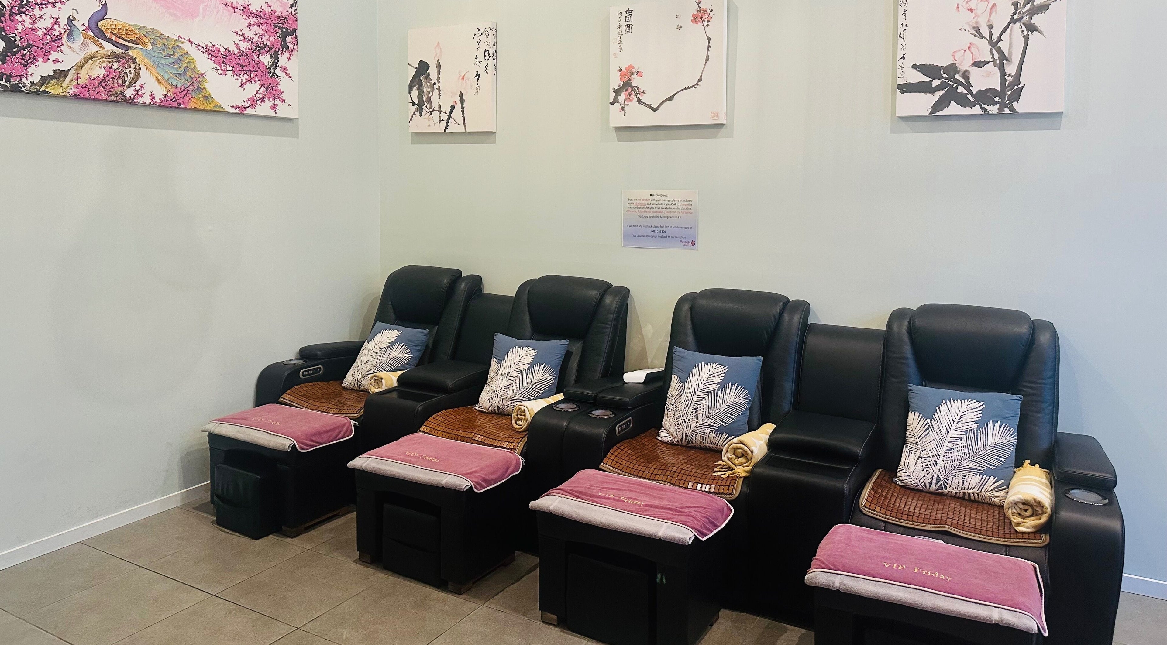 Comfortable massage chairs at Massage Aroma, Broadbeach Waters, Queensland, AU, offering a serene atmosphere.