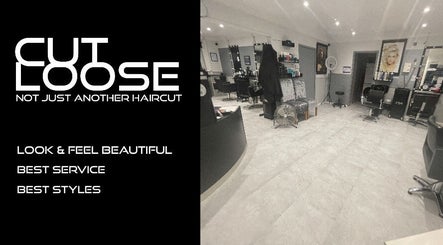 Interior of Cut Loose Hair Designs in Norwich, England, showcasing modern styling stations.