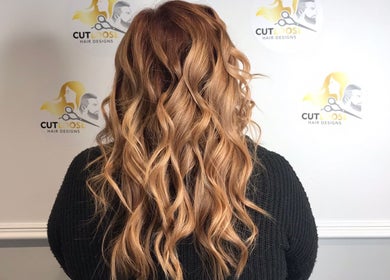 Elegant wavy hairstyle at Cut Loose Hair Designs in Norwich, England, GB.