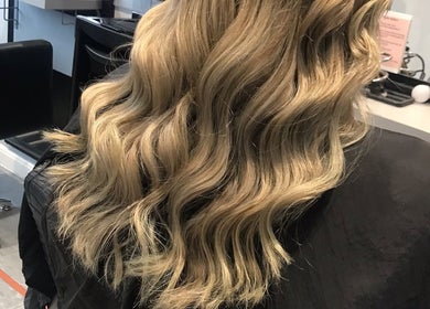 Blonde wavy hairstyle at Cut Loose Hair Designs, Norwich, England, GB.
