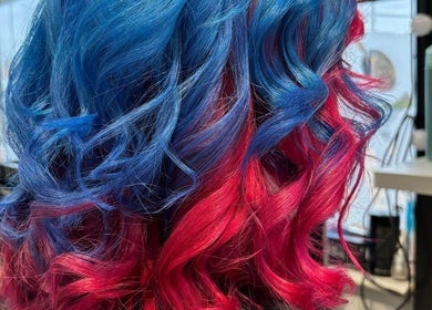 A vibrant blue and pink hair design at Cut Loose Hair Designs, Norwich, England, GB.