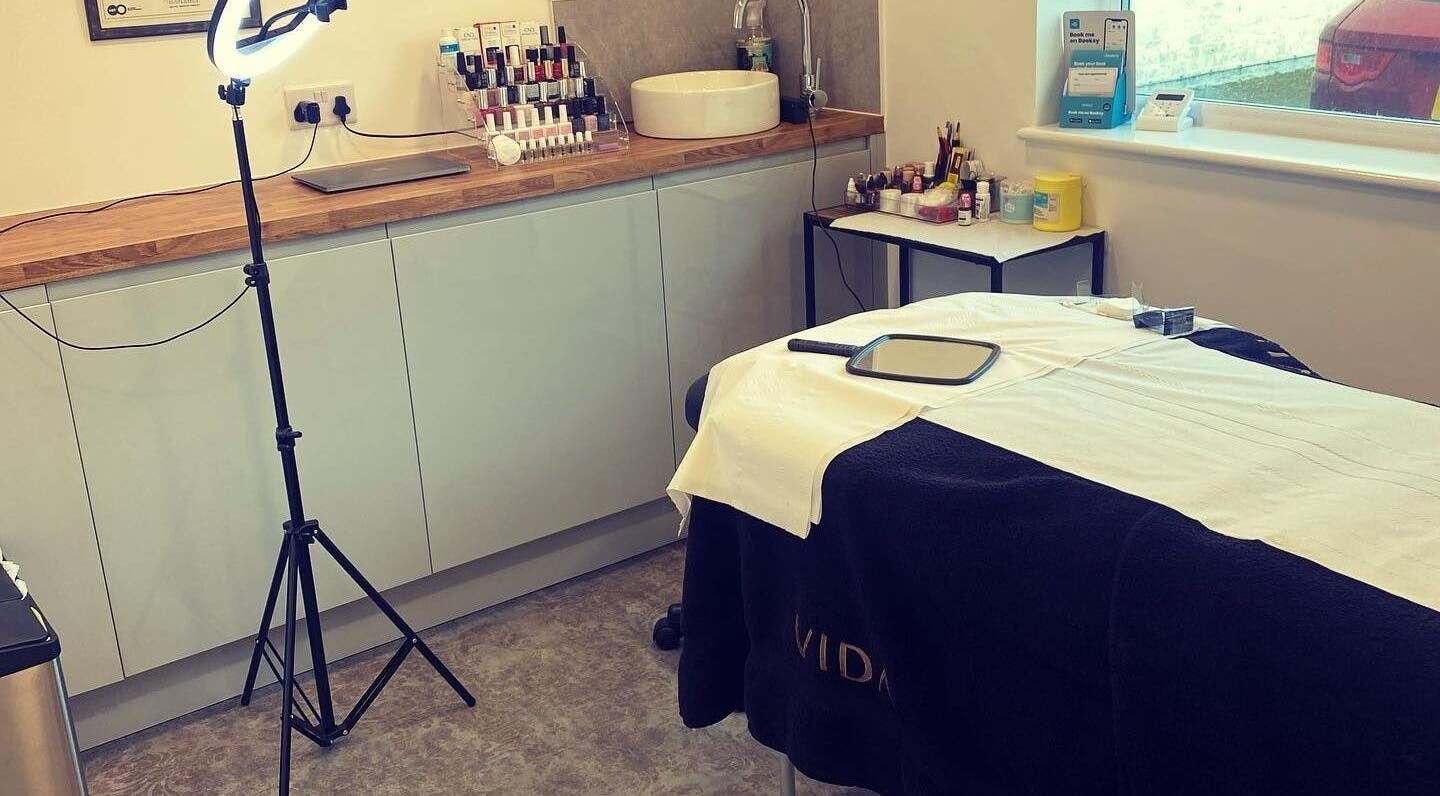 Calming beauty treatment space at Dahlyns Permanent Makeup, Liverpool, England, GB, showcasing modern setup.