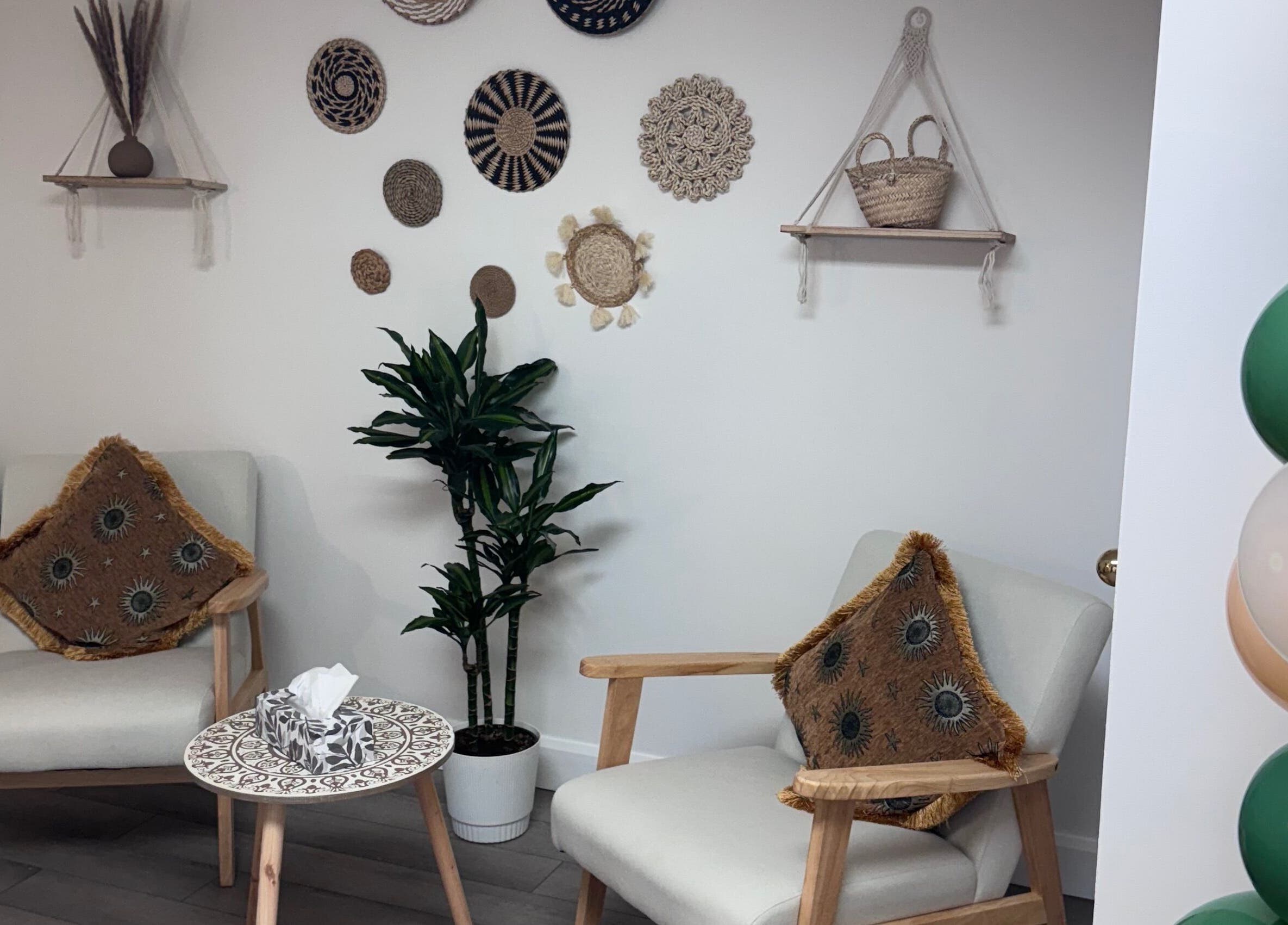 Cozy seating with boho decor at Bien-être Boho NDG, Montréal, Québec, CA.