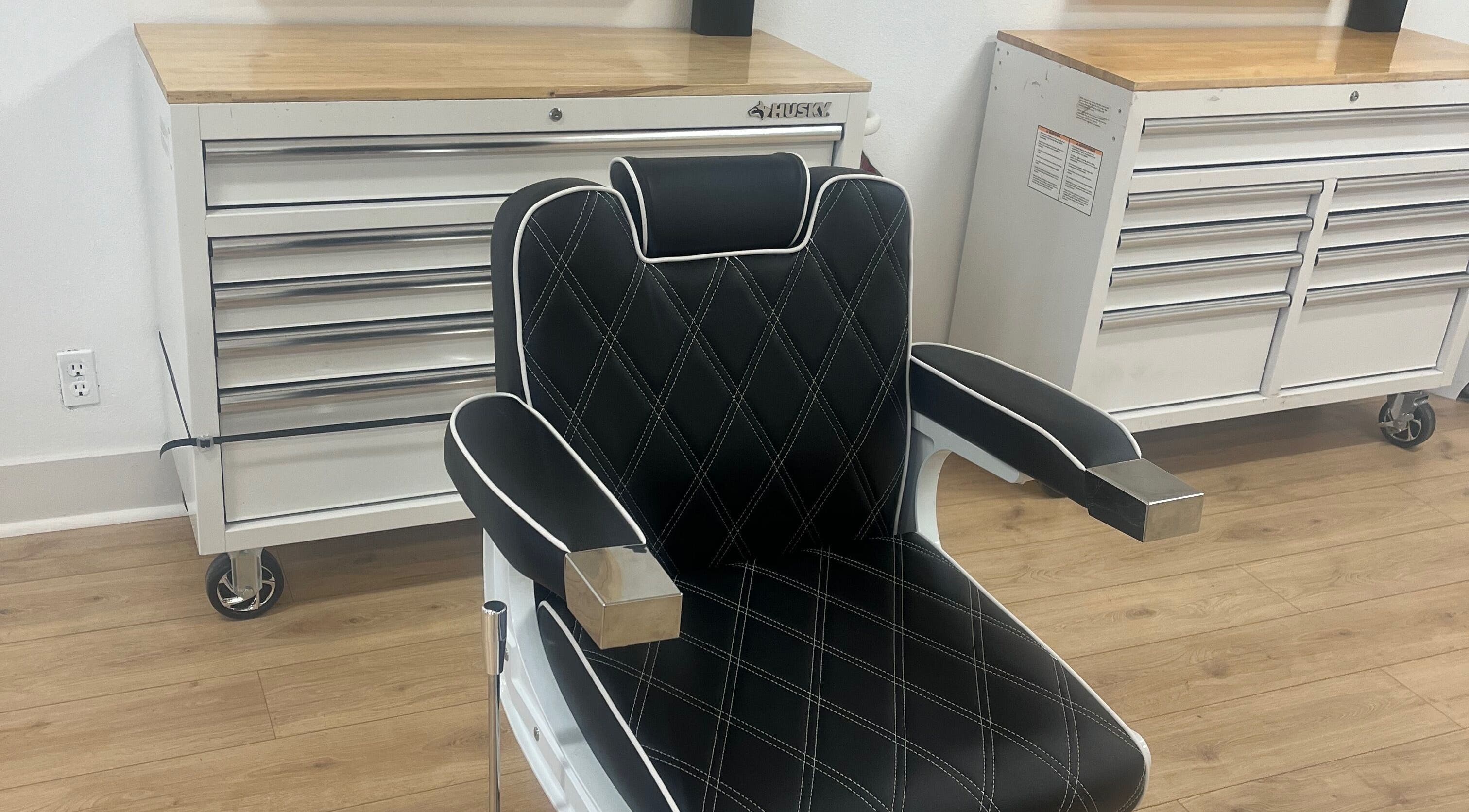 Black salon chair at 7570 winnetka, Los Angeles, California, US, perfect for beauty treatments.