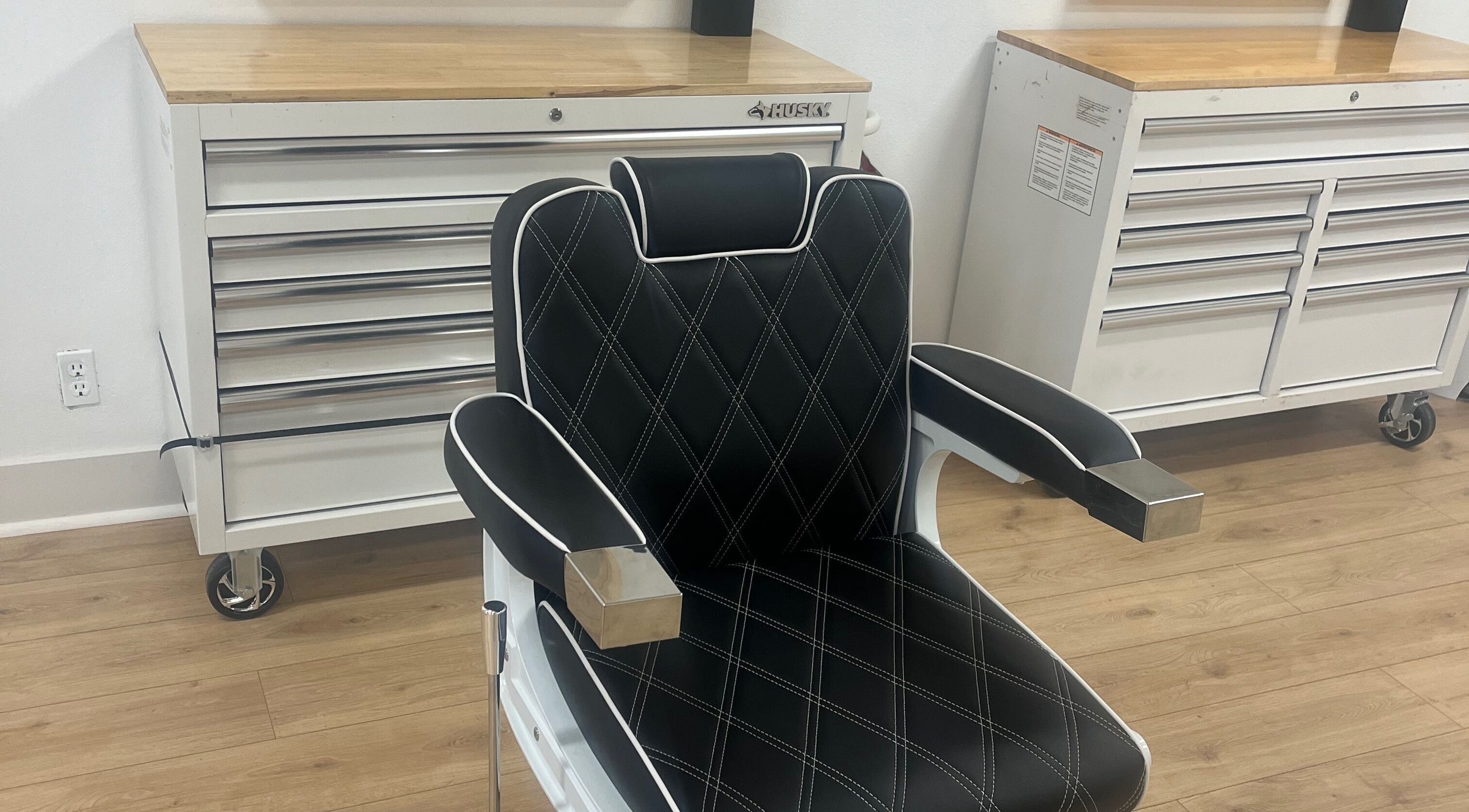 Black salon chair at 7570 winnetka, Los Angeles, California, US, perfect for beauty treatments.