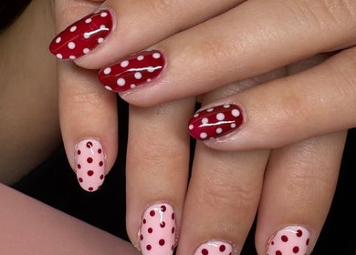 Elegant red and pink polka dot nails by Nails by Emily in Camberley, England, GB.