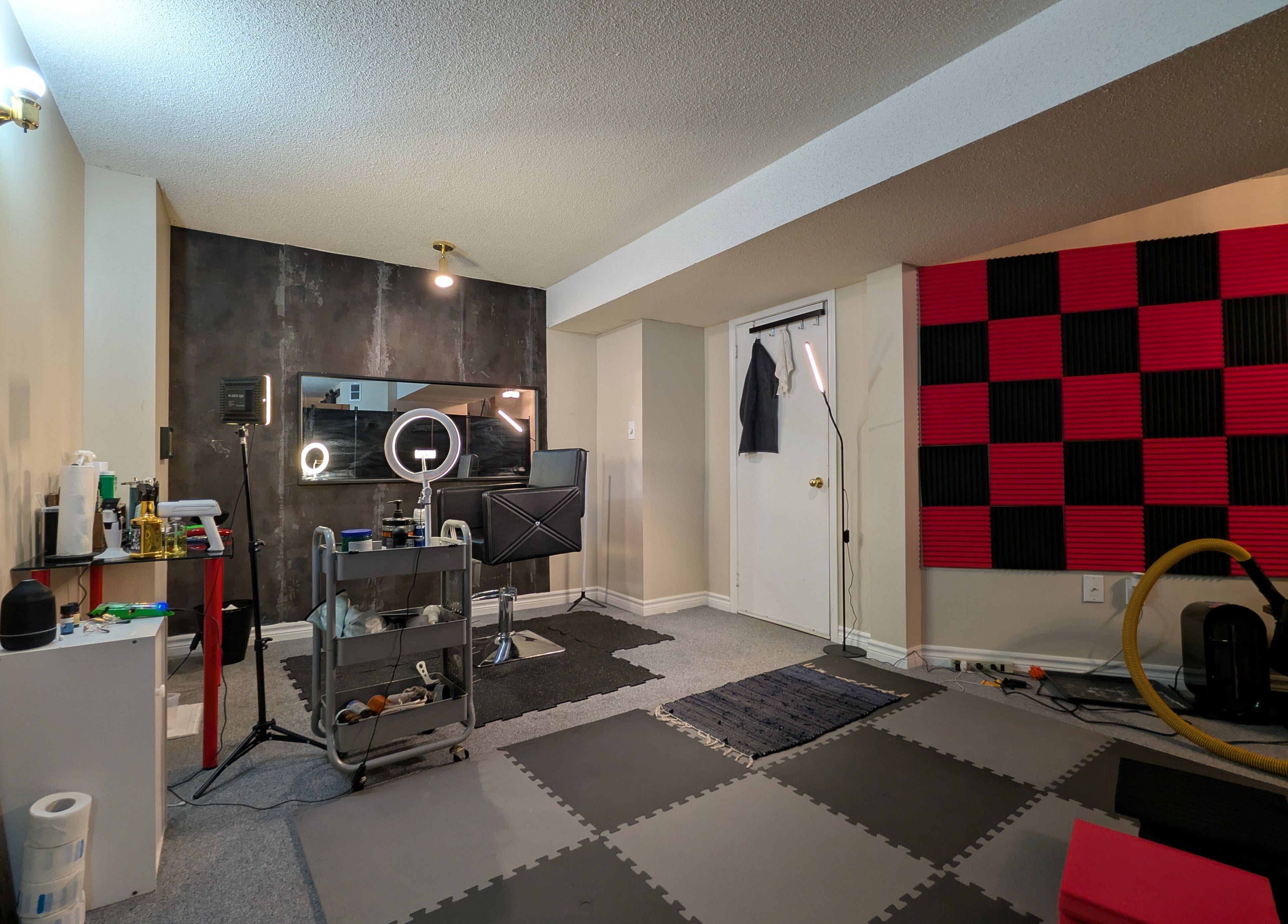 Professional styling station at T.Cutzzz in Pickering, Ontario, CA with equipment and seating.