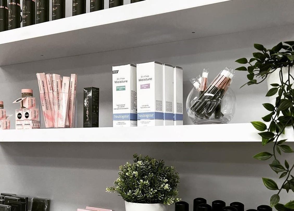 Product display at Lauren Elyse & Co, Woolooware, New South Wales, AU with cosmetics and greenery.