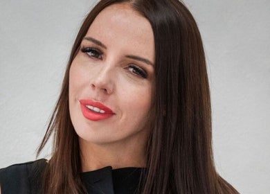 Portrait of a woman showcasing beauty treatments at FN Aesthetics in Denham, England, GB.