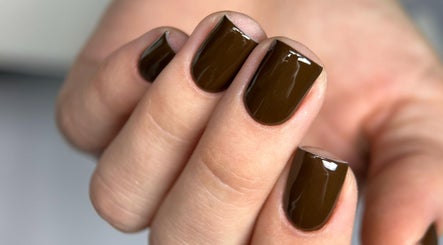 Elegant olive gloss nails at Rita’s Nails, Portsmouth, England, GB. Perfect manicure for a stylish look.