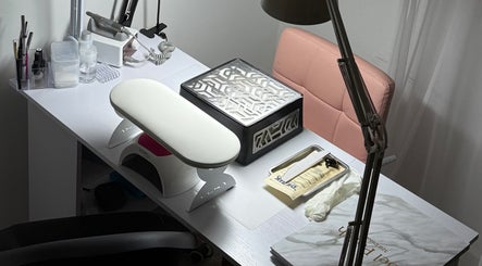 Modern nail station at Rita’s Nails, Portsmouth, England, GB, featuring professional tools and cozy seating.