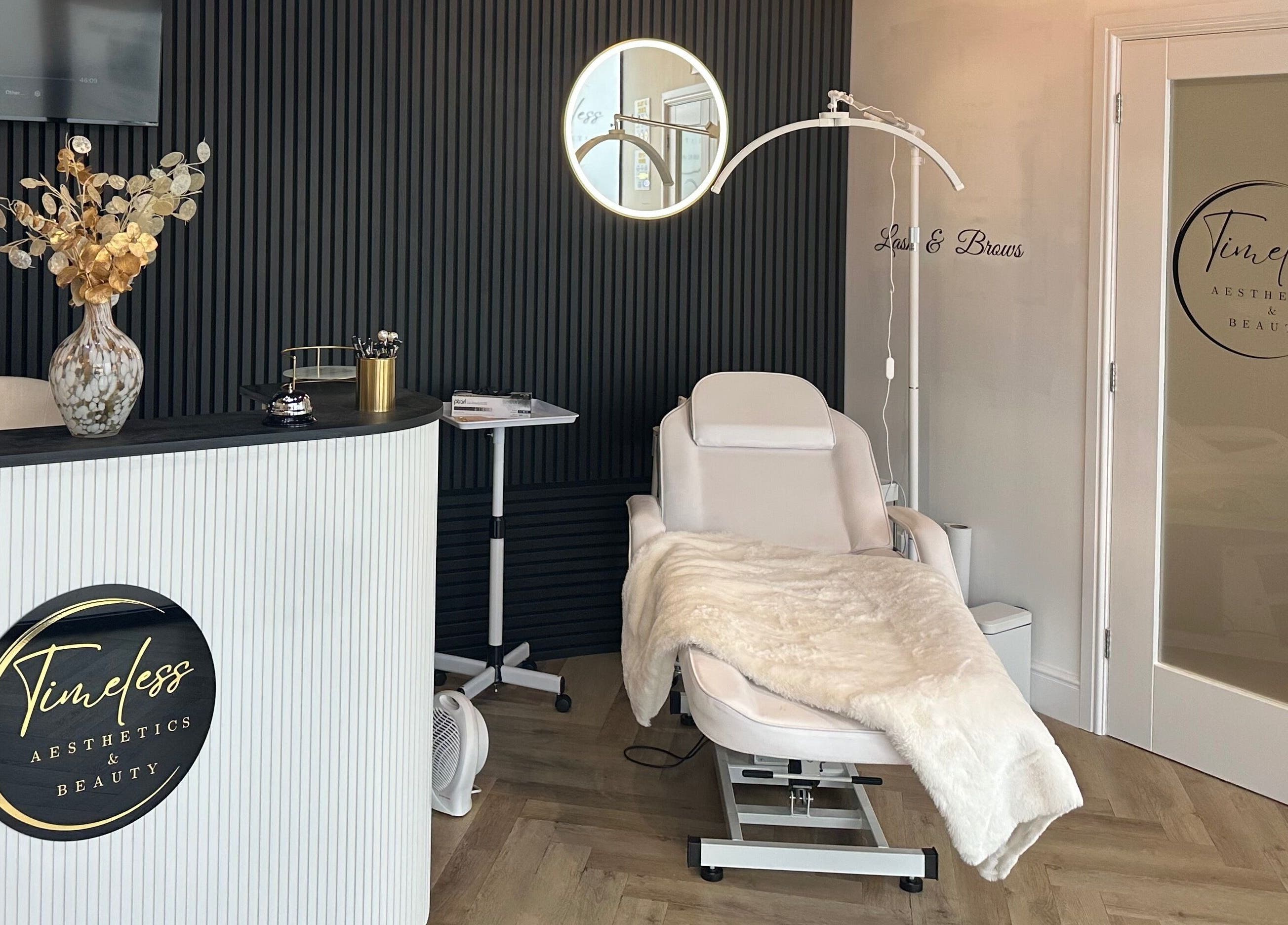 Interior of Timeless Aesthetics & Beauty in Lincoln, England, GB, featuring elegant decor and a plush treatment chair.