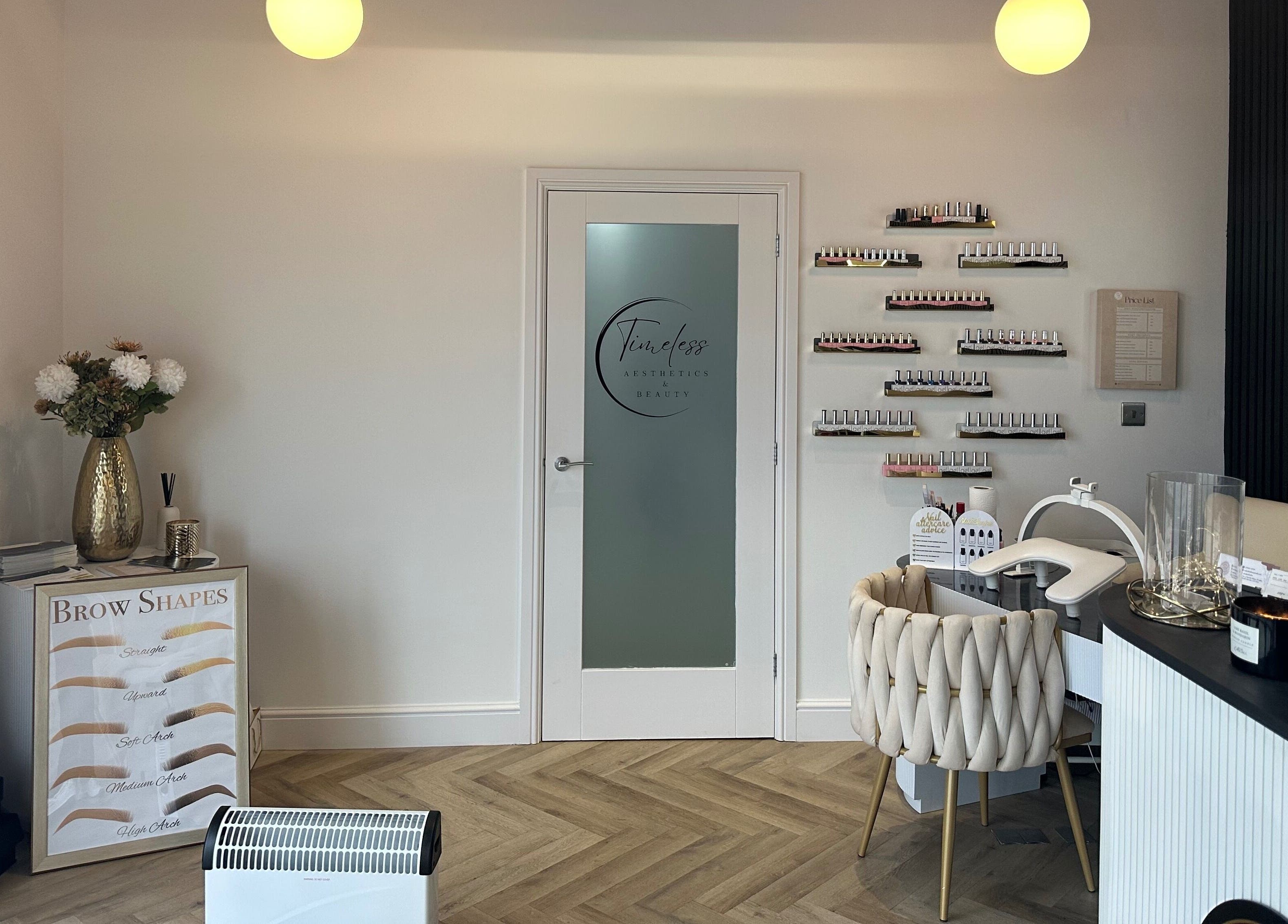 Interior of Timeless Aesthetics & Beauty in Lincoln, England, GB with elegant decor and manicure setup.