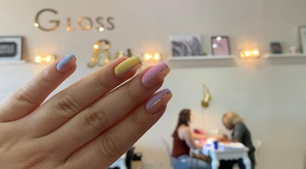 Stylish pastel manicure at Carlos Nails, Laval, Québec, CA, showcasing elegant nail art in vibrant colors.