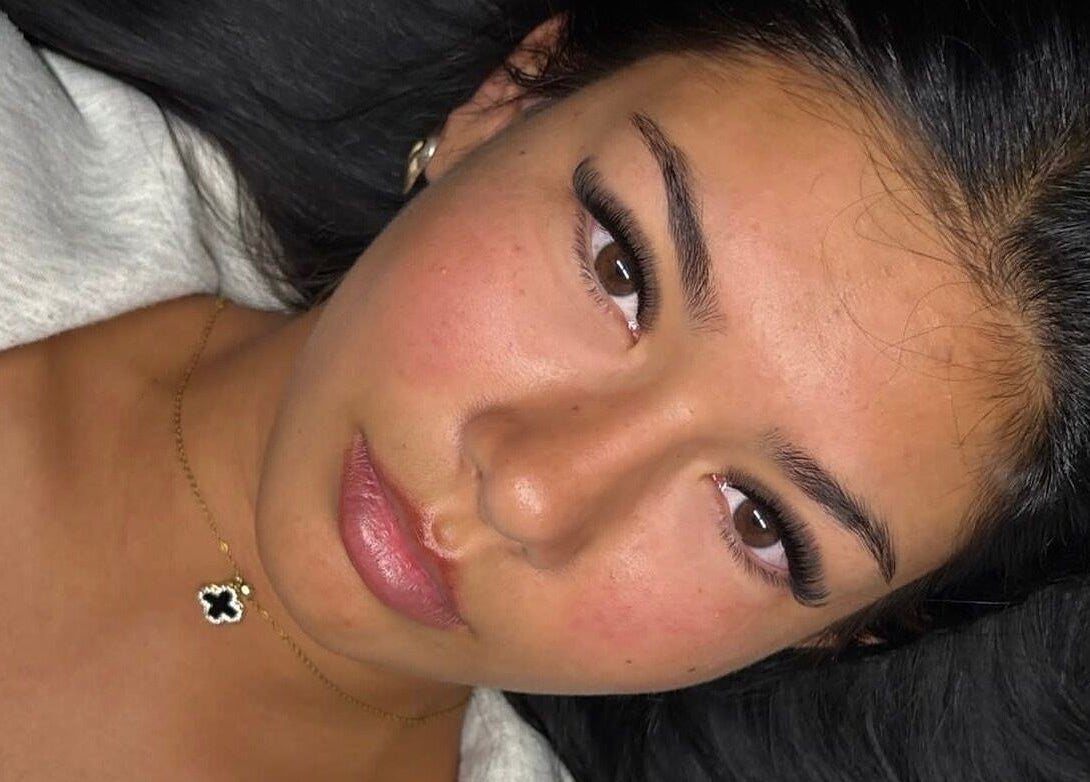 Close-up of woman with striking lashes at Laterals and Lashes in Coventry, England, GB.