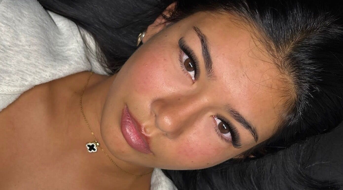 Close-up of woman with striking lashes at Laterals and Lashes in Coventry, England, GB.