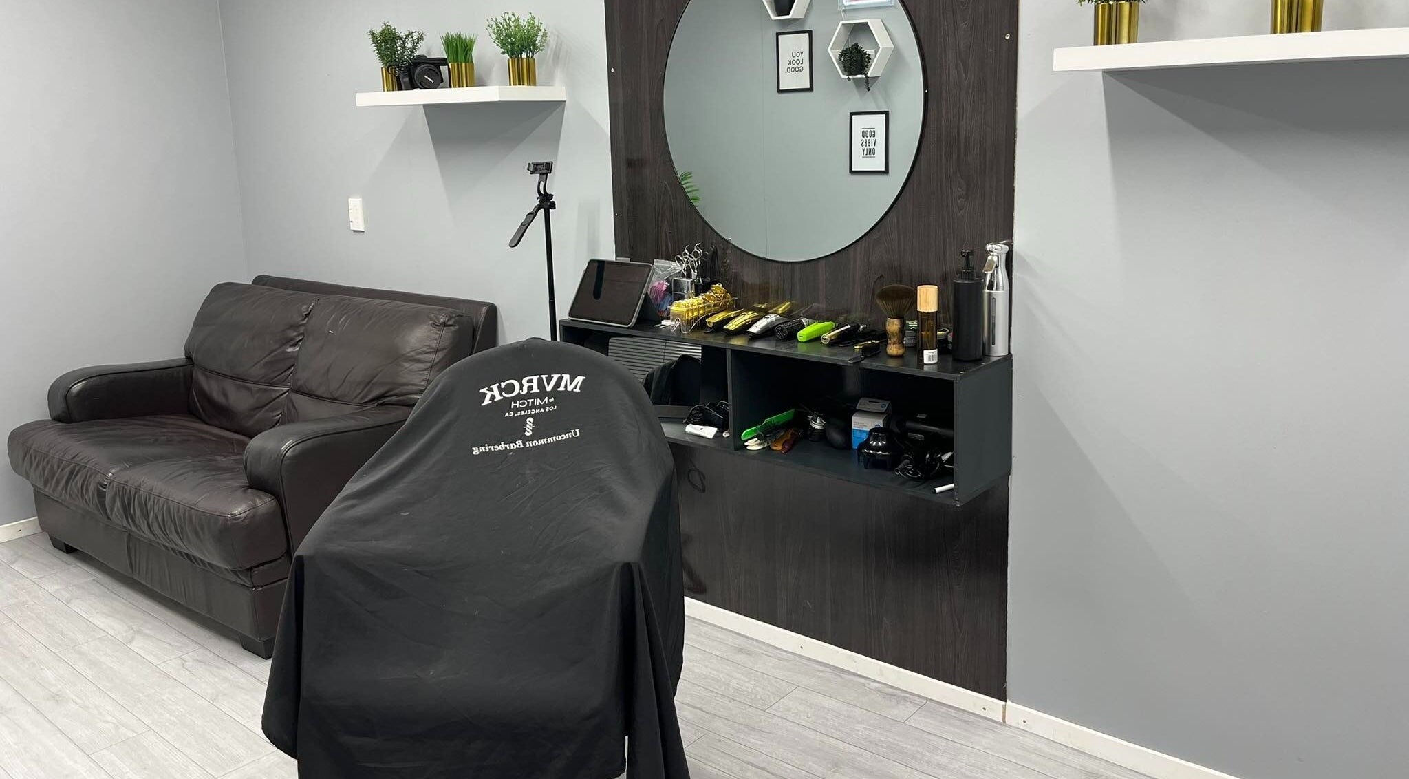 Stylish interior of LH Barbershop, Paraparaumu, Wellington, NZ, featuring modern decor and comfortable seating.