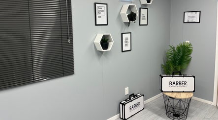 Sleek interior of LH Barbershop in Paraparaumu, Wellington, NZ with stylish decor and barbering kits.