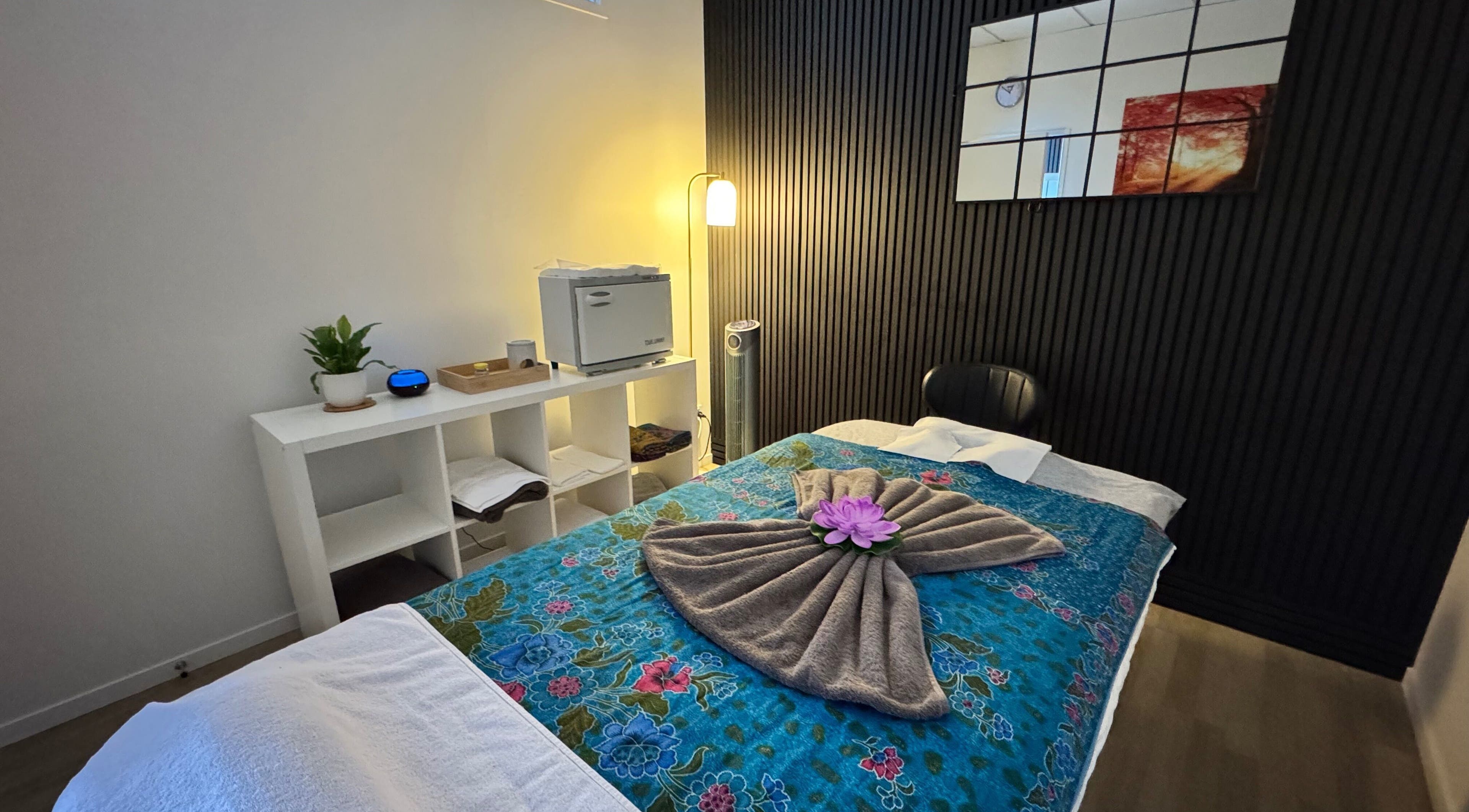Tranquil massage room at Massage Loft (Pukekohe), Pukekohe, Auckland, NZ with a beautifully decorated massage bed.