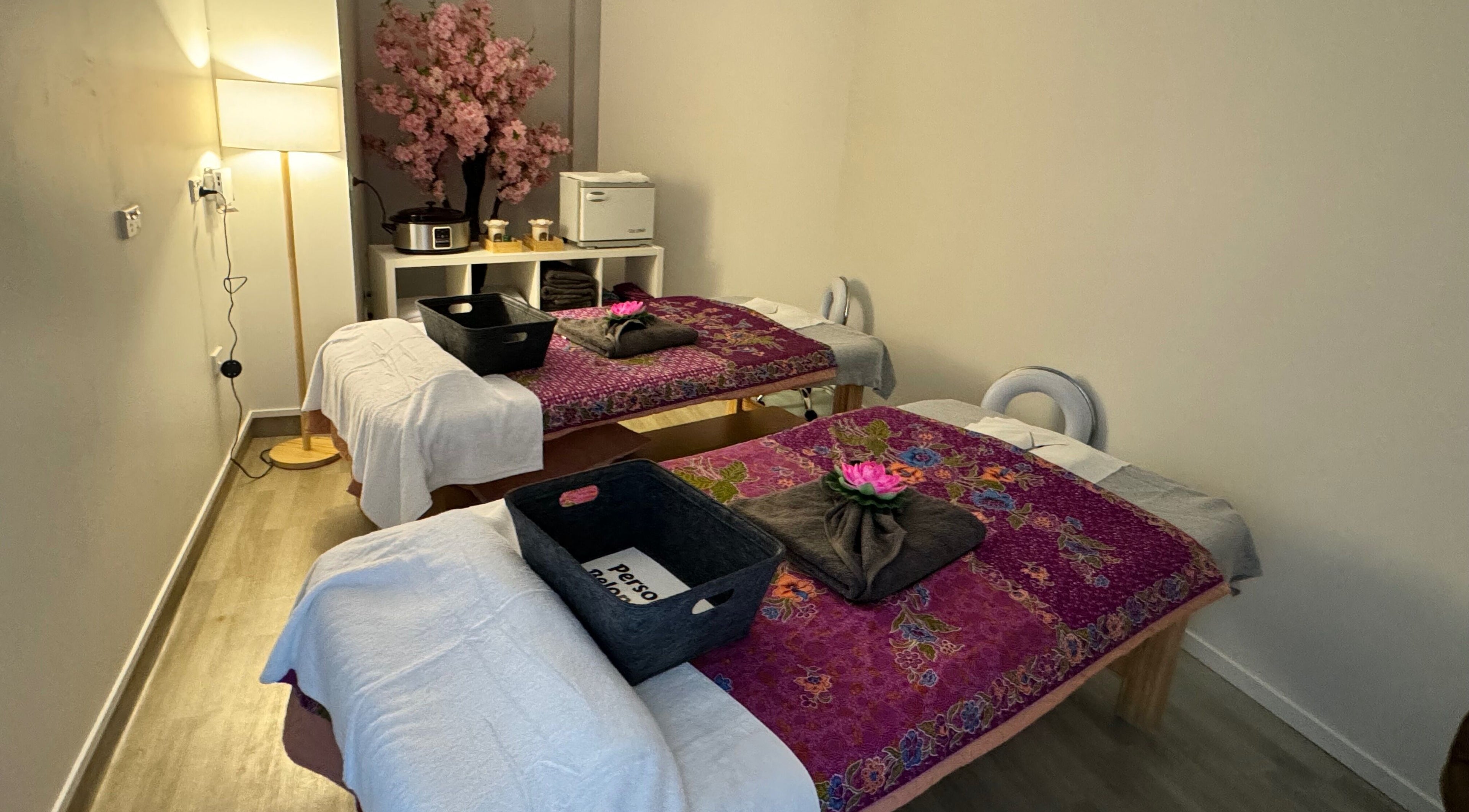 Tranquil massage room at Massage Loft (Pukekohe), Pukekohe, Auckland, NZ, featuring decorated massage tables.