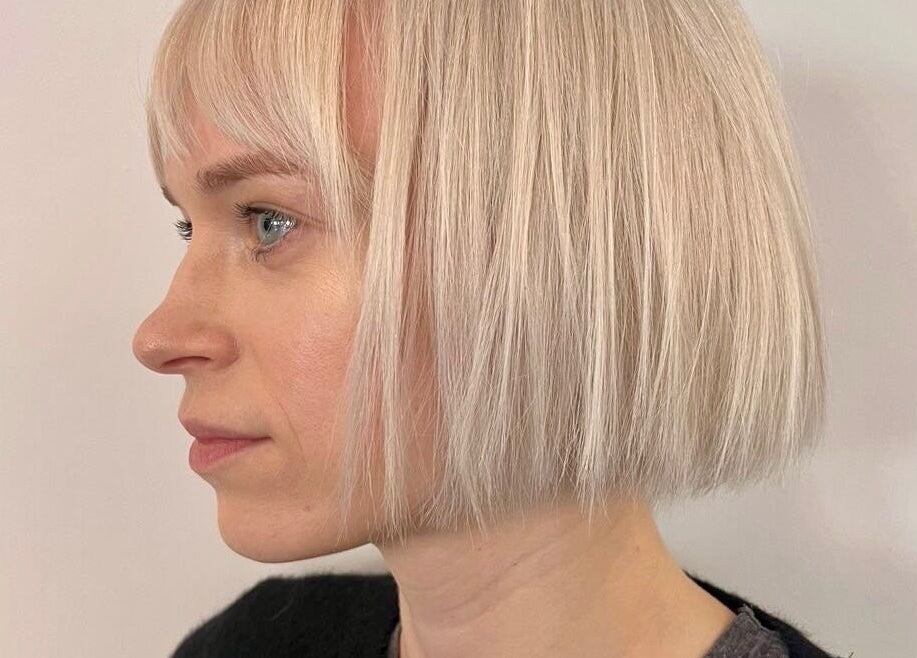 Stylish blonde bob hairstyle at Base Hair Studio, Llaneirwg, Cymru, GB.