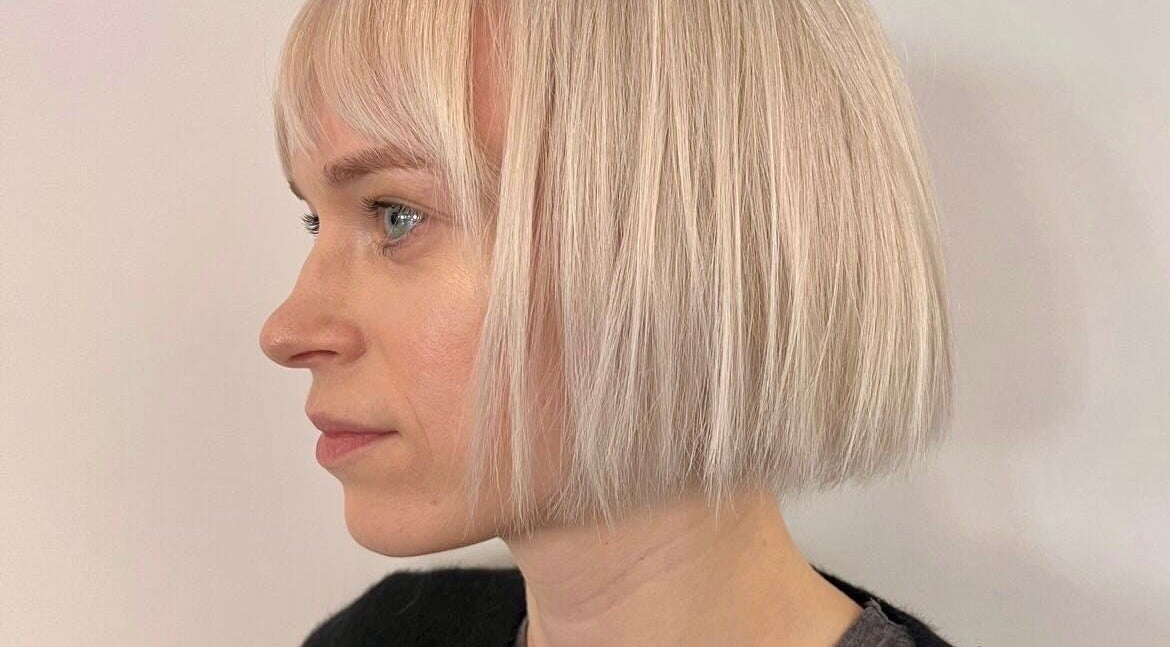 Stylish blonde bob hairstyle at Base Hair Studio, Llaneirwg, Cymru, GB.