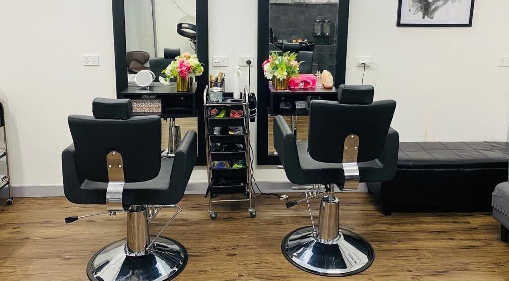 Modern salon interior of Bollywood cuts n brows in Melbourne, Victoria, AU with elegant styling chairs.