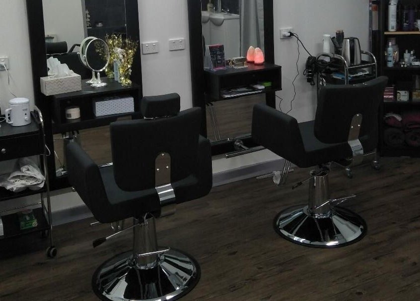 Modern salon chairs and styling stations at Bollywood cuts n brows, Melbourne, Victoria, AU.