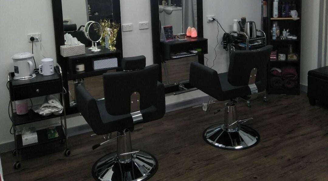 Modern salon chairs and styling stations at Bollywood cuts n brows, Melbourne, Victoria, AU.