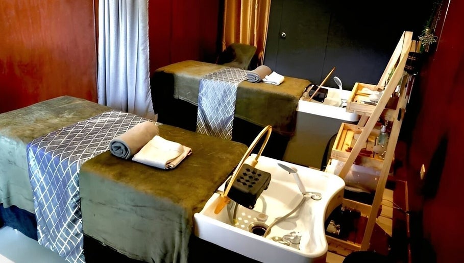 Relaxing treatment room at Essa Spa & Nails in Lapu-lapu City, Central Visayas, PH, featuring two massage beds.