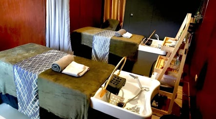 Relaxing treatment room at Essa Spa & Nails in Lapu-lapu City, Central Visayas, PH, featuring two massage beds.