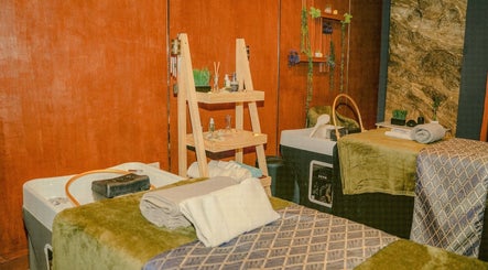 Relaxing spa room at Essa Spa & Nails, Lapu-lapu City, Central Visayas, PH with cozy decor and massage tables.