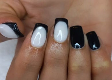 Stylish black and white manicure at T-Royals Beauty in Cape Town, Western Cape, ZA.