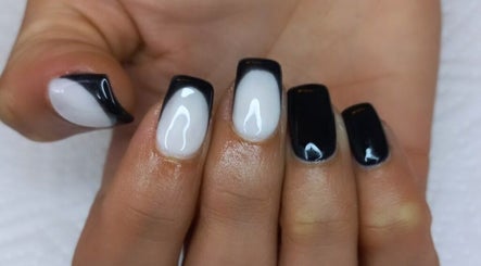 Stylish black and white manicure at T-Royals Beauty in Cape Town, Western Cape, ZA.