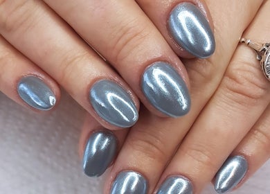 Shiny blue manicure at T-Royals Beauty, Cape Town, Western Cape, ZA.